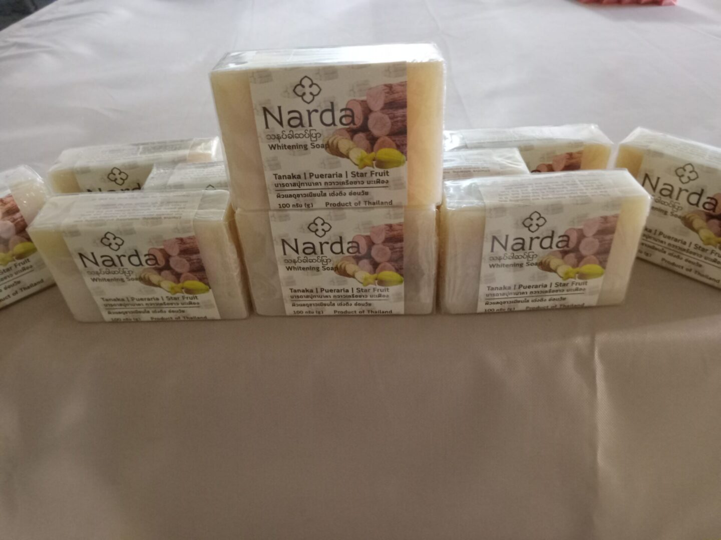 A group of bars of soap sitting on top of a table.